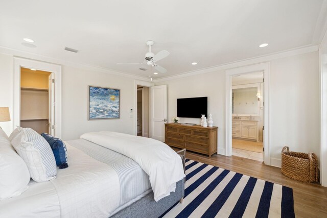 17 Compass Point Way, Watersound, FL 32461 - bedroom featuring wood finished floors, recessed lighting, ornamental molding, ensuite bath, and ceiling fan