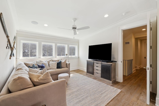 17 Compass Point Way, Watersound, FL 32461 - living room featuring ornamental molding, light wood finished floors, a ceiling fan, baseboards, and recessed lighting