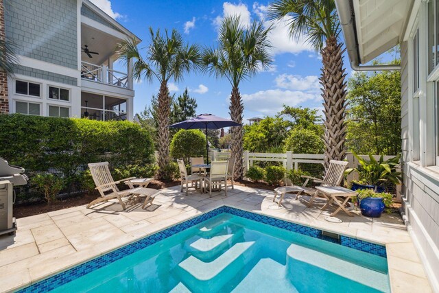 17 Compass Point Way, Watersound, FL 32461 - view of pool featuring ceiling fan, a patio, fence, and outdoor dining space