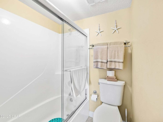 23223 Front Beach Rd Unit A114, Panama City Beach, FL 32413 - bathroom featuring toilet and shower / bath combination with glass door