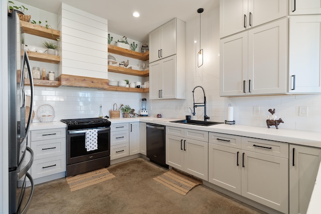 kitchen featuring stainless steel gas range oven, open shelves, dishwasher, a sink, and recessed lighting