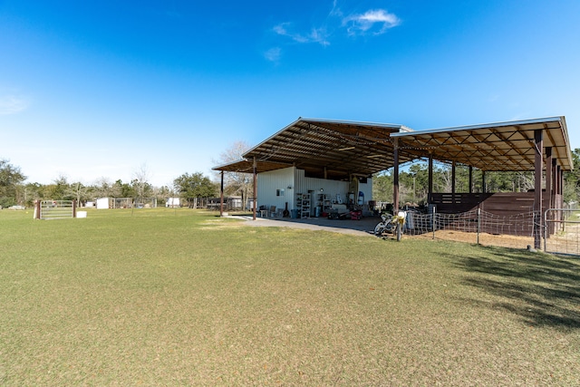 view of yard with an outbuilding and an exterior structure