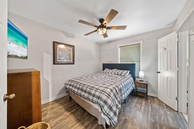 439 Big Cedar Rd, Ponce De Leon, FL 32455 - bedroom featuring baseboards, wood finished floors, and a ceiling fan