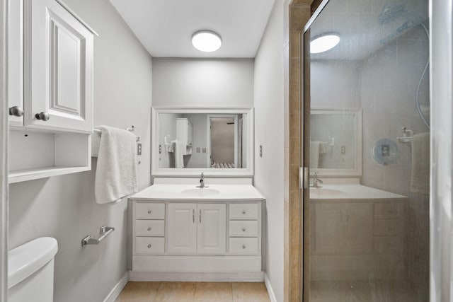 439 Big Cedar Rd, Ponce De Leon, FL 32455 - full bath featuring a stall shower, baseboards, vanity, and toilet