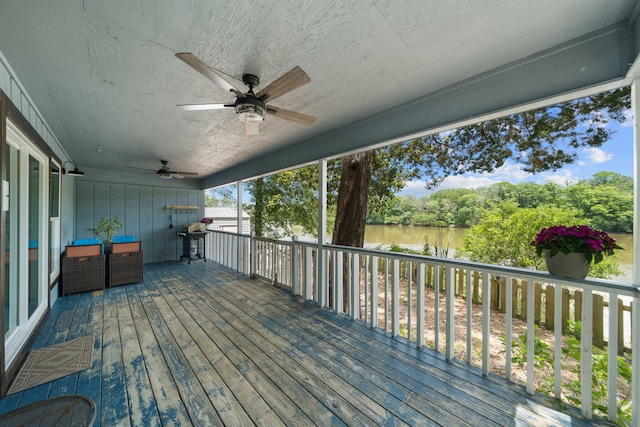 439 Big Cedar Rd, Ponce De Leon, FL 32455 - wooden terrace with ceiling fan and a water view