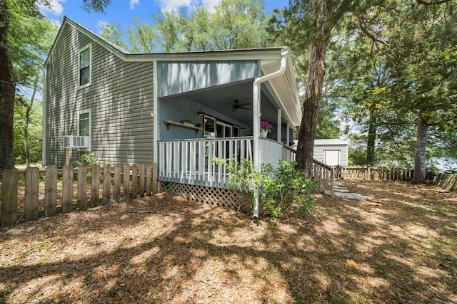 439 Big Cedar Rd, Ponce De Leon, FL 32455 - view of front facade featuring ceiling fan, fence, and cooling unit