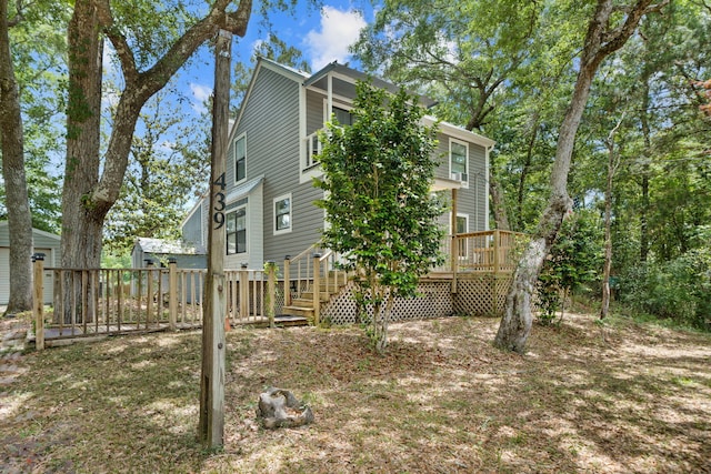 439 Big Cedar Rd, Ponce De Leon, FL 32455 - view of side of home with a deck and stairway