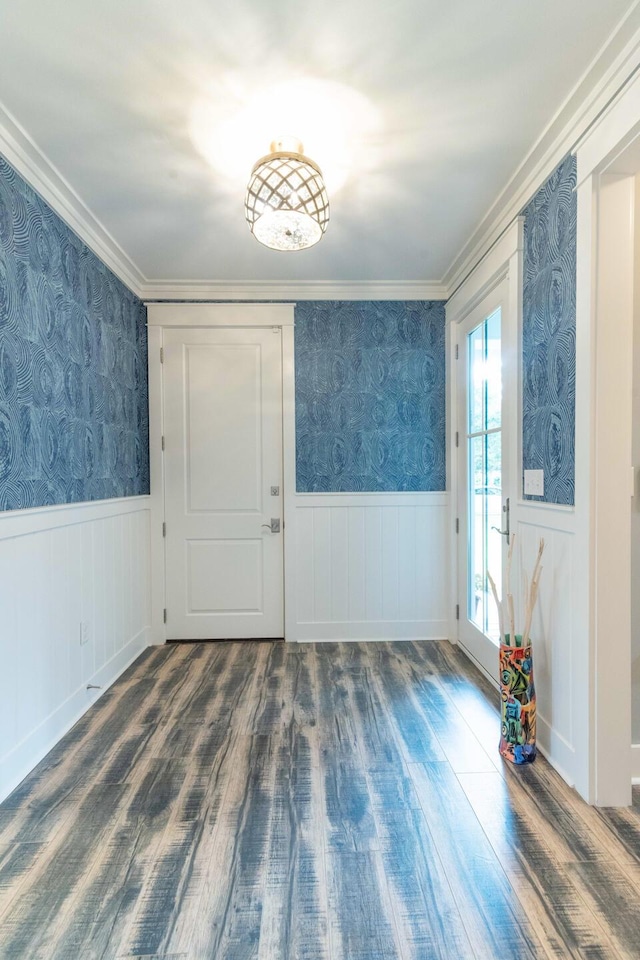 105 Somersault Ln, Inlet Beach, FL 32461 - spare room featuring wood finished floors, wallpapered walls, wainscoting, and crown molding