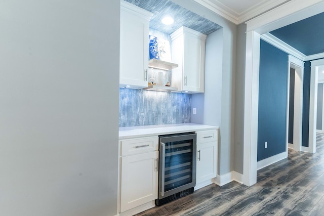 105 Somersault Ln, Inlet Beach, FL 32461 - indoor dry bar featuring wine cooler, backsplash, dark wood-type flooring, and ornamental molding