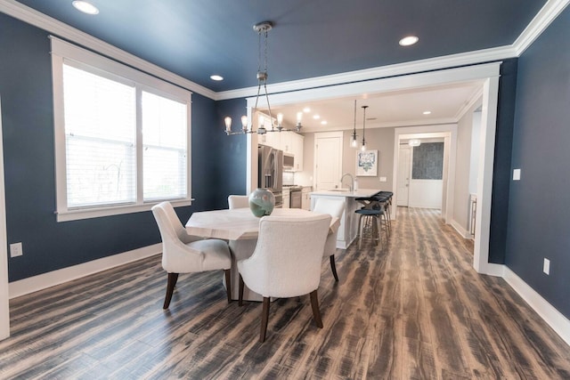 105 Somersault Ln, Inlet Beach, FL 32461 - dining space with ornamental molding, dark wood finished floors, a chandelier, and recessed lighting