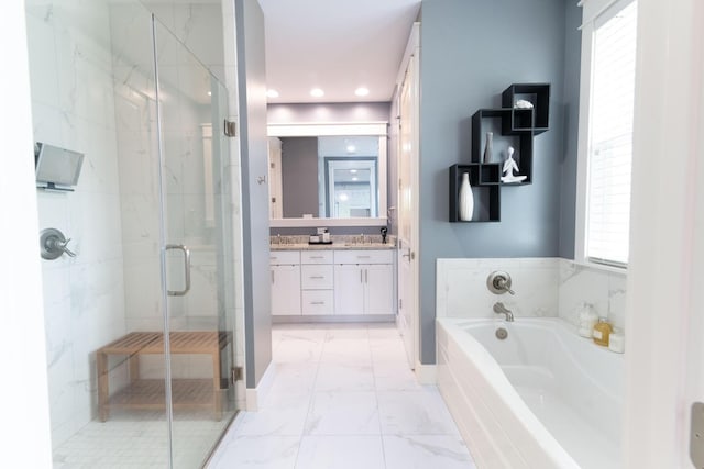 105 Somersault Ln, Inlet Beach, FL 32461 - bathroom with double vanity, a shower stall, a bath, marble look tiles, and recessed lighting