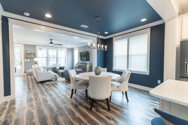 105 Somersault Ln, Inlet Beach, FL 32461 - dining area with crown molding, dark wood-type flooring, a chandelier, recessed lighting, and a ceiling fan