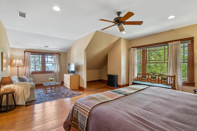 25 17th St, Apalachiacola, FL 32320 - bedroom featuring vaulted ceiling, wood finished floors, baseboards, a ceiling fan, and recessed lighting