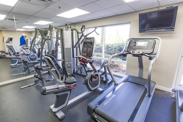 gym with a drop ceiling