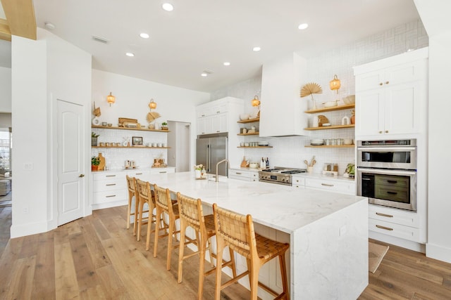 1341 Driftwood Point Rd, Santa Rosa Beach, FL 32459 - kitchen featuring open shelves, appliances with stainless steel finishes, backsplash, light wood-style flooring, and recessed lighting