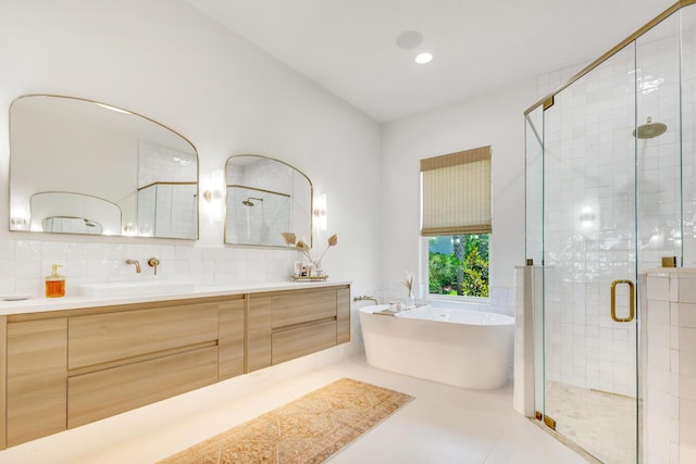 1341 Driftwood Point Rd, Santa Rosa Beach, FL 32459 - full bathroom featuring a shower stall, a freestanding tub, vanity, and backsplash