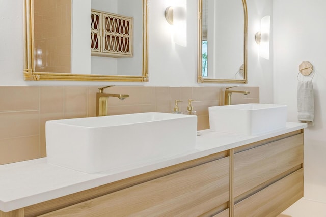 1341 Driftwood Point Rd, Santa Rosa Beach, FL 32459 - full bath with tile walls, double vanity, and a wainscoted wall