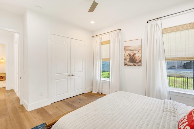 1341 Driftwood Point Rd, Santa Rosa Beach, FL 32459 - bedroom with light wood-type flooring, a closet, baseboards, recessed lighting, and a ceiling fan