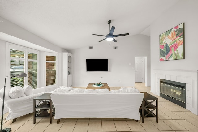 149 Kel Wen Cir, Destin, FL 32541 - living area with ceiling fan, vaulted ceiling, a fireplace, and light tile patterned flooring