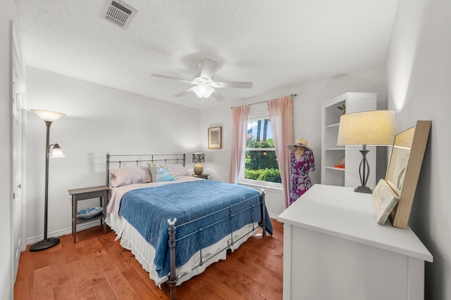 149 Kel Wen Cir, Destin, FL 32541 - bedroom featuring wood finished floors, a ceiling fan, and baseboards
