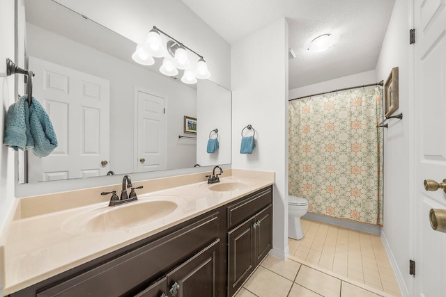 149 Kel Wen Cir, Destin, FL 32541 - full bath with toilet, double vanity, baseboards, tile patterned flooring, and curtained shower