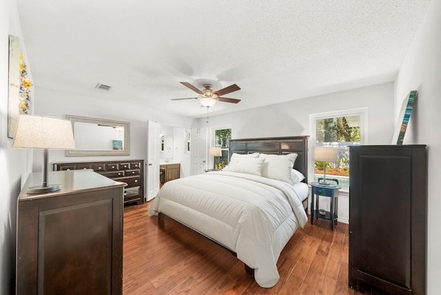 149 Kel Wen Cir, Destin, FL 32541 - bedroom featuring wood finished floors, ensuite bath, and a ceiling fan