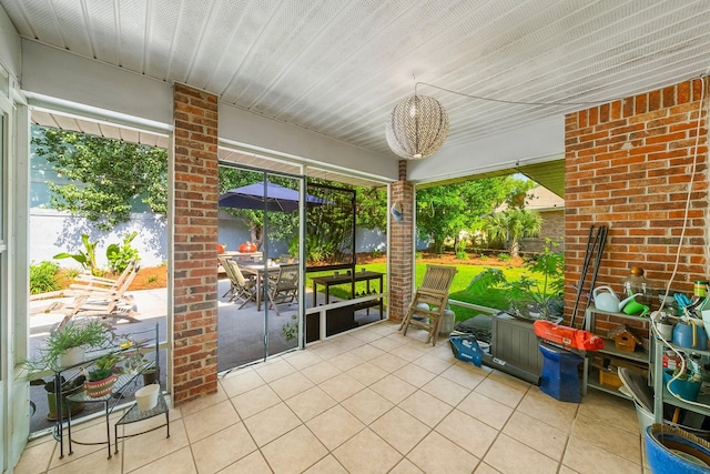 149 Kel Wen Cir, Destin, FL 32541 - unfurnished sunroom featuring outdoor dining area