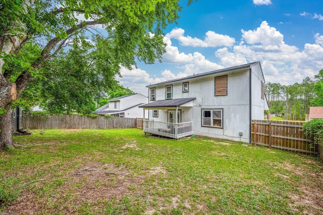 124 Palmetto Dr, Crestview, FL 32539 - rear view of house featuring a wooden deck