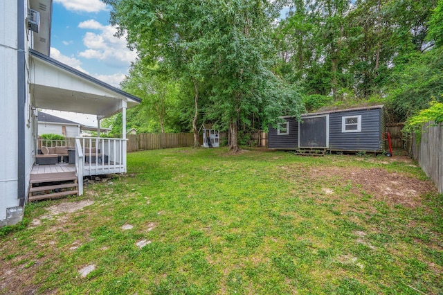 124 Palmetto Dr, Crestview, FL 32539 - view of yard with a wooden deck and an outbuilding