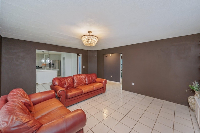 124 Palmetto Dr, Crestview, FL 32539 - living room featuring a chandelier and light tile patterned flooring
