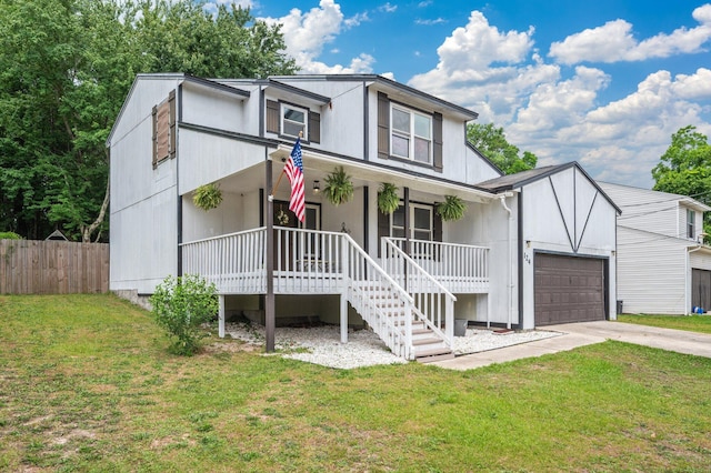 124 Palmetto Dr, Crestview, FL 32539 - view of front of house with a porch, driveway, an attached garage, and stairway