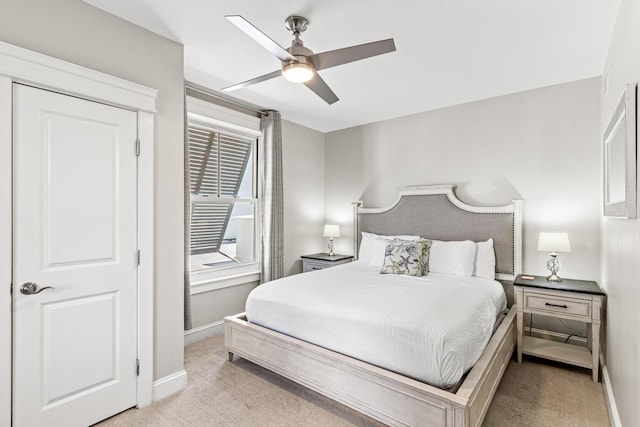 9500 Grand Sandestin Blvd Unit 2325, Miramar Beach, FL 32550 - bedroom with light colored carpet, baseboards, and ceiling fan