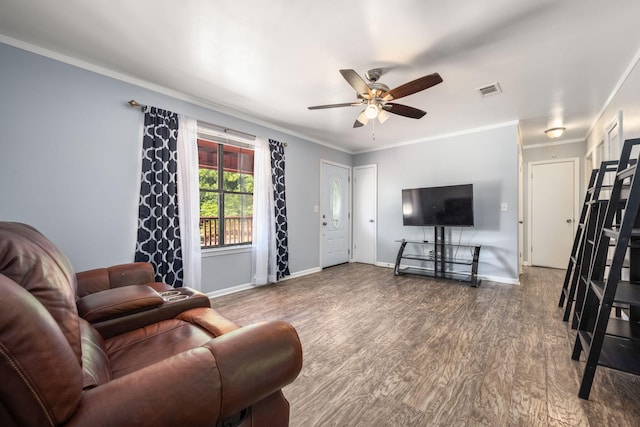 205 Florence Dr, Defuniak Springs, FL 32433 - living room featuring ceiling fan, wood finished floors, baseboards, and ornamental molding