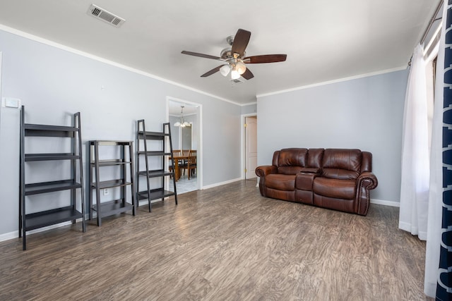 205 Florence Dr, Defuniak Springs, FL 32433 - living room with a ceiling fan, baseboards, wood finished floors, and crown molding