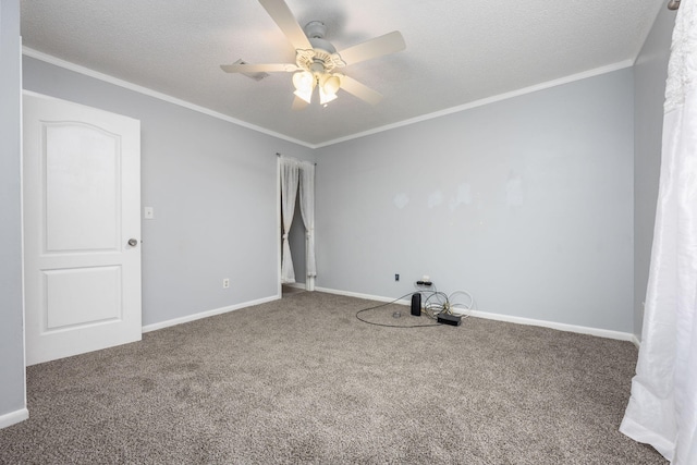 205 Florence Dr, Defuniak Springs, FL 32433 - carpeted spare room with a ceiling fan, baseboards, a textured ceiling, and ornamental molding