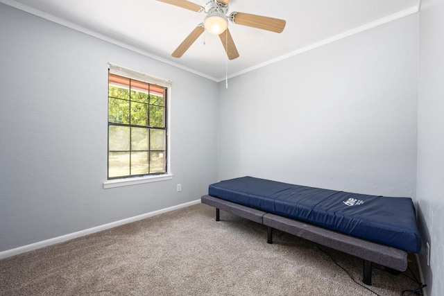205 Florence Dr, Defuniak Springs, FL 32433 - bedroom with carpet, crown molding, baseboards, and ceiling fan
