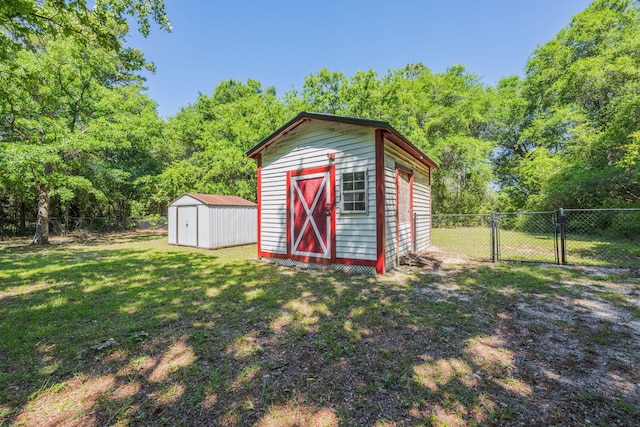 205 Florence Dr, Defuniak Springs, FL 32433 - view of shed with a gate
