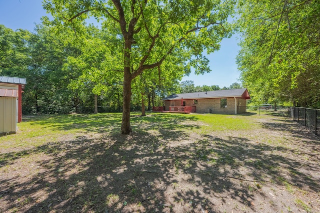 205 Florence Dr, Defuniak Springs, FL 32433 - view of yard with a deck