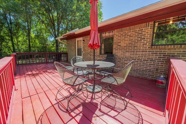 205 Florence Dr, Defuniak Springs, FL 32433 - deck with outdoor dining space