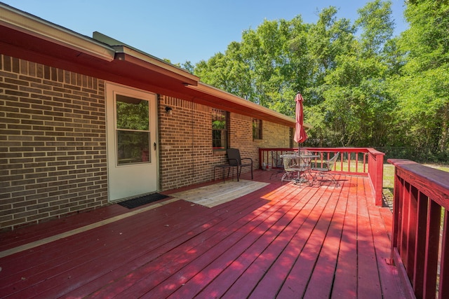 205 Florence Dr, Defuniak Springs, FL 32433 - deck with outdoor dining area