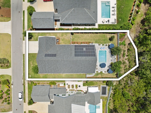 view of property location with a pool area and property parcel outlined