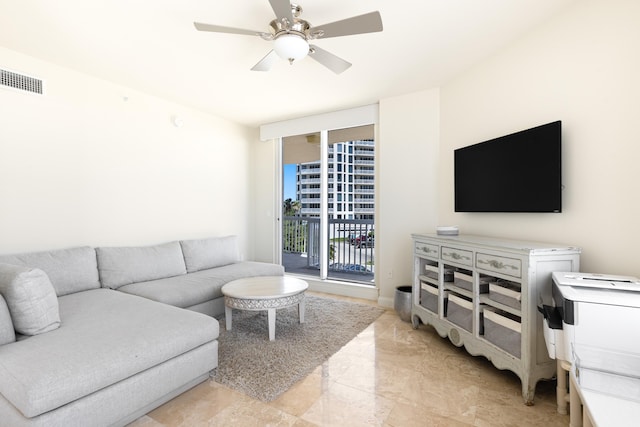 15400 Emerald Coast Pkwy Unit 301, Destin, FL 32541 - living area featuring ceiling fan and light marble finish floors