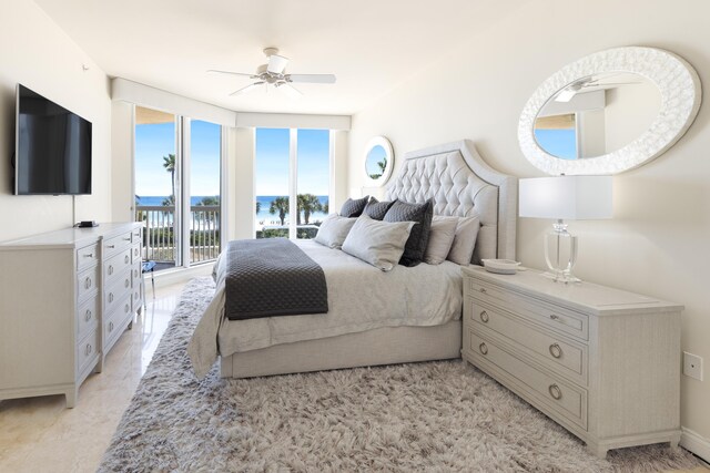 15400 Emerald Coast Pkwy Unit 301, Destin, FL 32541 - bedroom with access to exterior, a water view, and a ceiling fan