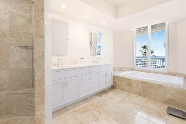 15400 Emerald Coast Pkwy Unit 301, Destin, FL 32541 - bathroom featuring tiled shower, a bath, double vanity, and recessed lighting