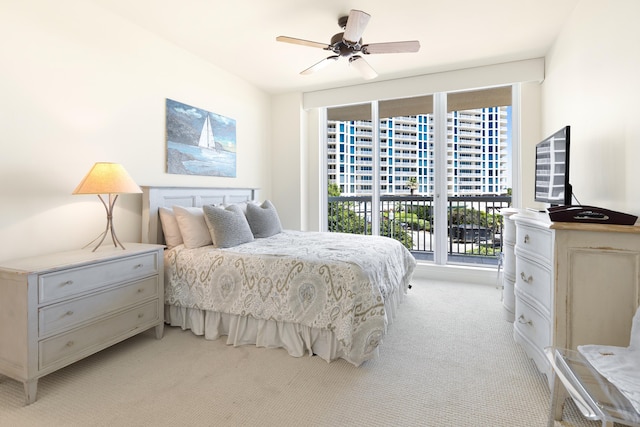 15400 Emerald Coast Pkwy Unit 301, Destin, FL 32541 - bedroom with light carpet, access to outside, and ceiling fan