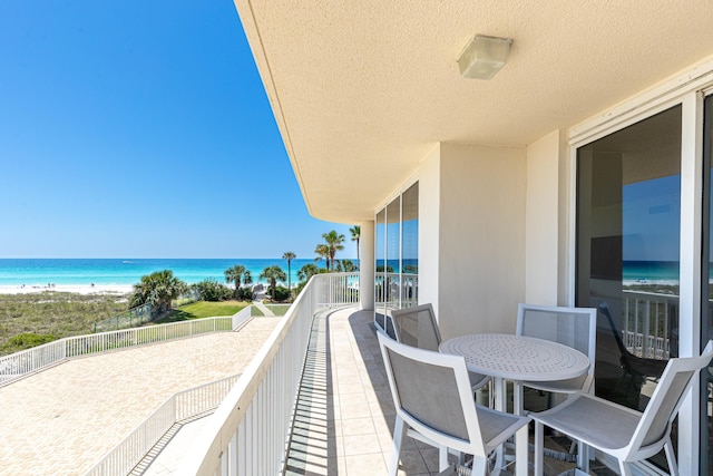 15400 Emerald Coast Pkwy Unit 301, Destin, FL 32541 - balcony featuring view of water and beach