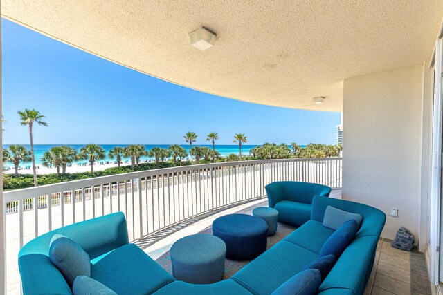 15400 Emerald Coast Pkwy Unit 301, Destin, FL 32541 - balcony featuring a water view and an outdoor hangout area