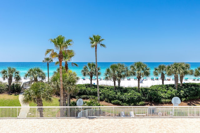 15400 Emerald Coast Pkwy Unit 301, Destin, FL 32541 - water view featuring fence and nearby beach