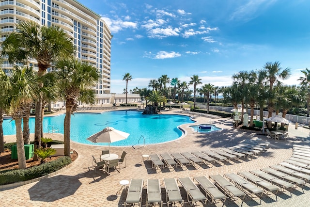 15400 Emerald Coast Pkwy Unit 301, Destin, FL 32541 - community pool with a patio and a community hot tub