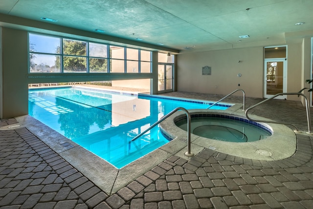 15400 Emerald Coast Pkwy Unit 301, Destin, FL 32541 - indoor pool featuring a hot tub